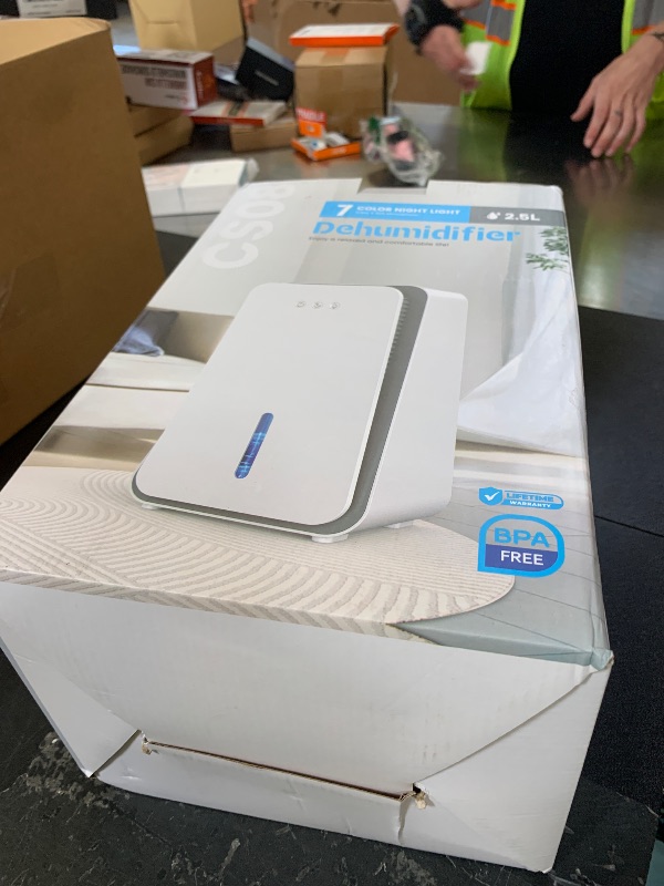 Photo 1 of Dehumidifier for Home, Quiet Portable Dehumidifier with Auto Shut Off, 7-Color LED Light for Basement, Bedroom, Bathroom,Snowy