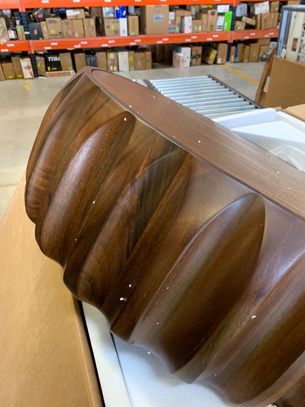 Photo 1 of Round Solid Wood Carved Coffee Table with Elegant Sculptural Design
