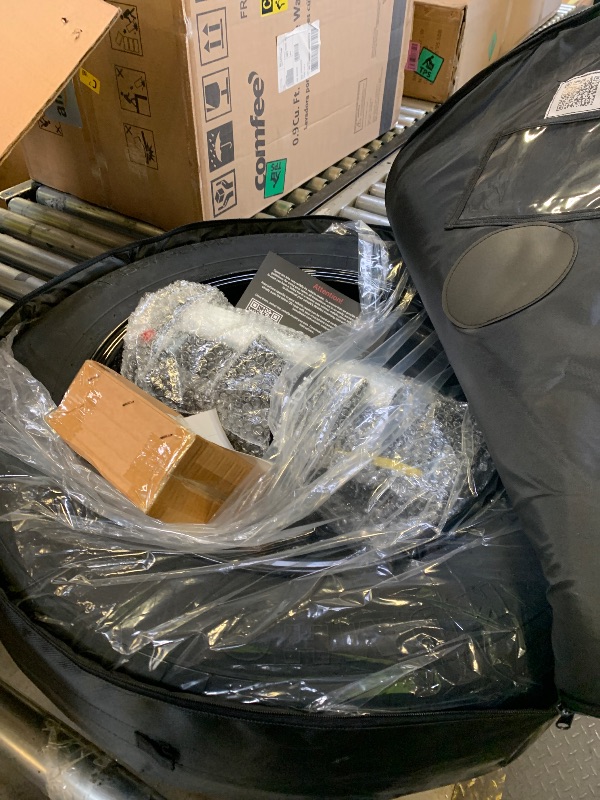 Photo 1 of spare tire carrying case with moderen spare (29x6" for moderen spare kits