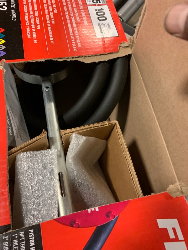 Photo 1 of Fill-Rite FR152 Piston Hand Pump with Hose & Nozzle Spout, Red