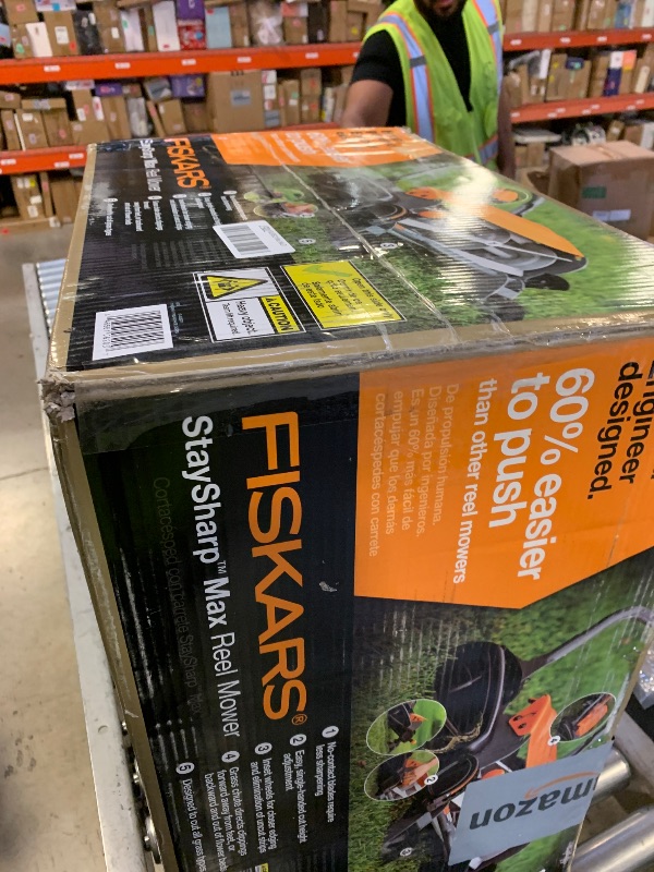 Photo 1 of Fiskars Push Mower, Cut Width Manual Reel Mower with No Motor, Eco-Friendly Manual Reel Lawn Care, 18", Black