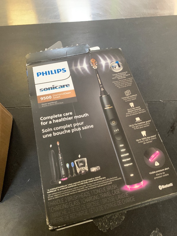 Photo 1 of Philips Sonicare DiamondClean Smart 9500 Electric Toothbrush, Sonic Toothbrush with App, Pressure Sensor, Brush Head Detection, 5 Brushing Modes and 3 Intensity Levels, Black, Model HX9923/11