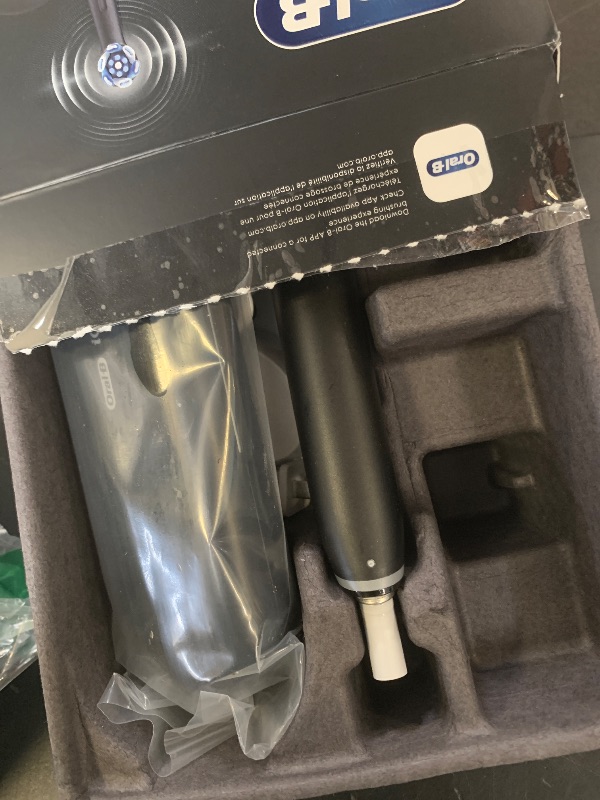 Photo 1 of Oral-B Rechargeable Electric Toothbrush, iO9 Limited Ultimate Clean, 7 Cleaning Modes, Interactive Display, iSense Charger, Charging Travel Case, Visible Pressure Sensor, 3 Brush Heads, Black