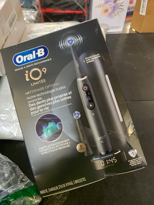 Photo 1 of Oral-B Rechargeable Electric Toothbrush, iO9 Limited Ultimate Clean, 7 Cleaning Modes, Interactive Display, iSense Charger, Charging Travel Case, Visible Pressure Sensor, 3 Brush Heads, Black