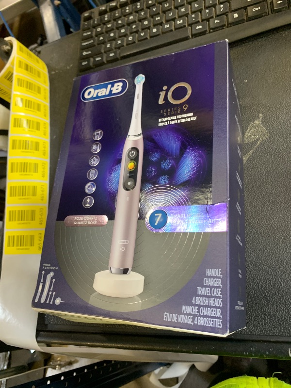 Photo 1 of Oral-B Rechargeable Electric Toothbrush, iO9 Genius, 7 Cleaning Modes, Interactive Display, Charging Travel Case, Visible Pressure Sensor, 4 Brush Heads, Rose Quartz