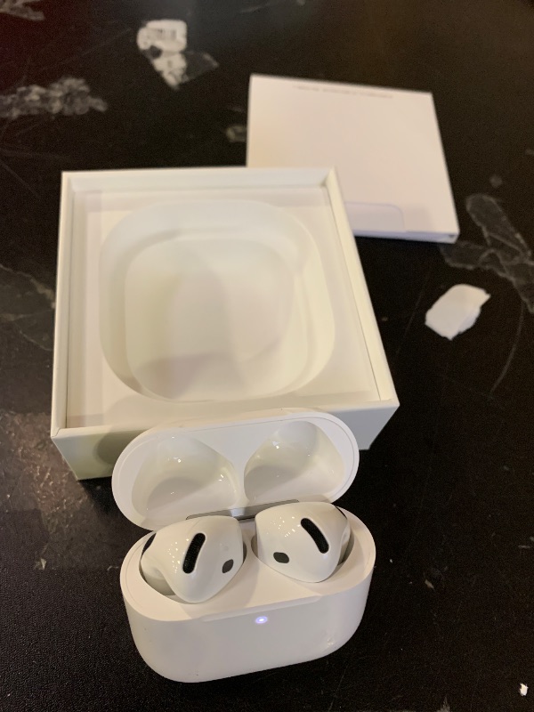 Photo 1 of Apple AirPods 4 Wireless Earbuds, Bluetooth Headphones, with Active Noise Cancellation, Adaptive, Transparency Mode, Personalized Spatial Audio, USB-C Charging Case, Wireless Charging, H2 Chip