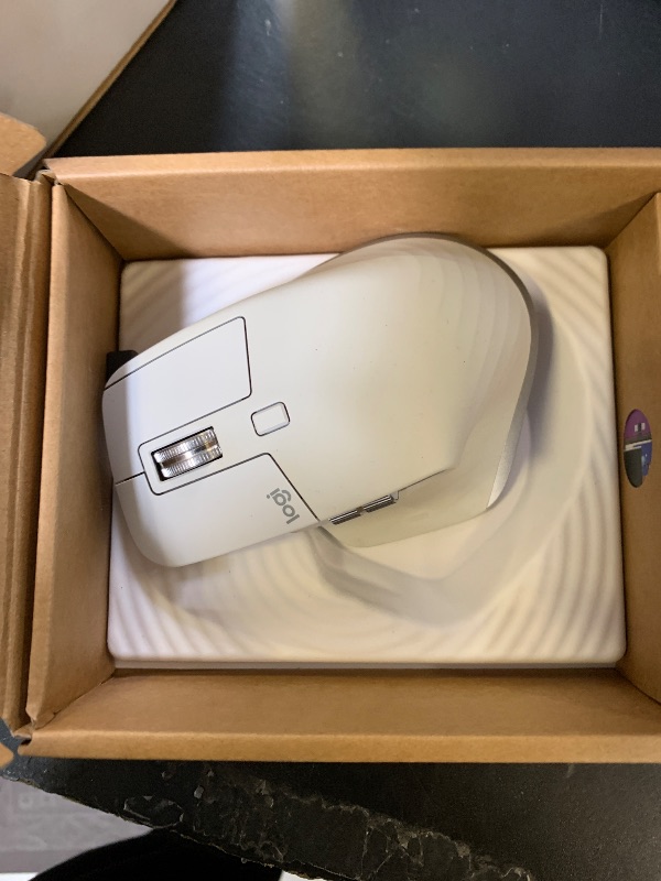Photo 1 of Logitech MX Master 4, Ergonomic Wireless Mouse with Advanced Performance Haptic Feedback, Ultra-Fast Scrolling, USB-C Charging, Bluetooth, Windows, MacOS - Pale Gray
