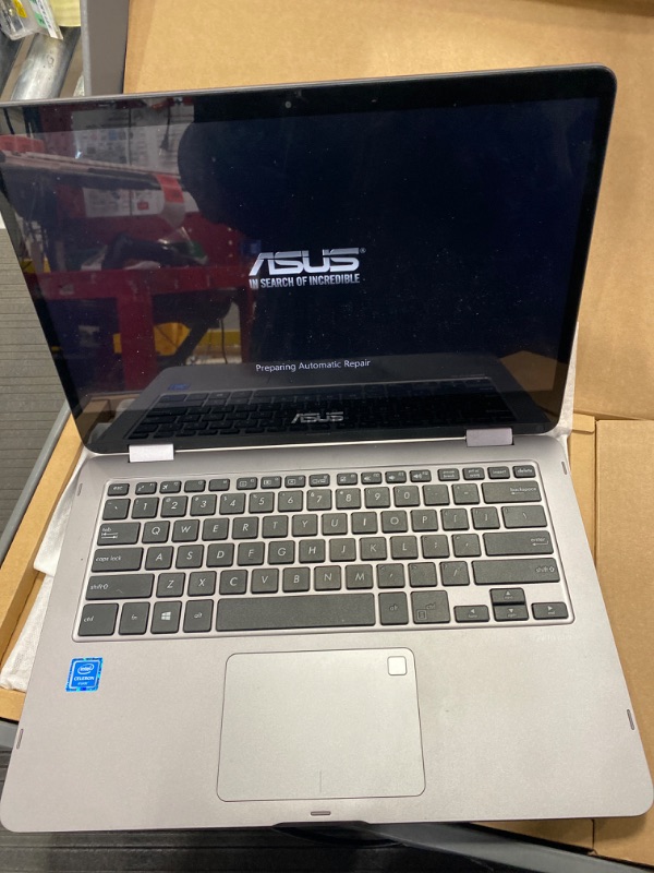 Photo 1 of *** WILL NOT FULLY POWER ON. WILL NOT STAY ON ***ASUS TP401M Vivobook Flip Thin 2-in-1 HD Touchscreen Laptop, Intel Celeron 2.6GHz Processor, 4GB RAM, 64GB eMMC, Windows 10 S, 14" (Renewed)