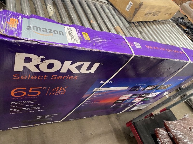 Photo 1 of **DAMAGED SCREEN** Roku Smart TV – 65-Inch Select Series, 4K HDR TV – RokuTV with Enhanced Voice Remote – Flat Screen LED Television with Wi-Fi for Streaming Live Local News, Sports, Family Entertainment