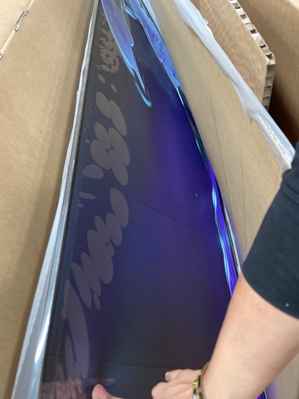 Photo 1 of **DAMAGED SCREEN** Roku Smart TV – 65-Inch Select Series, 4K HDR TV – RokuTV with Enhanced Voice Remote – Flat Screen LED Television with Wi-Fi for Streaming Live Local News, Sports, Family Entertainment