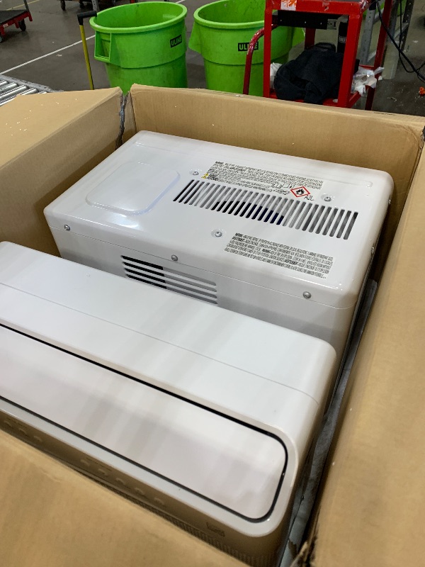 Photo 1 of (SOLD AS PARTS)  8,000 BTU U Shaped Smart Inverter Window Air Conditioner - Cools 350 Sq Ft, Ultra Quiet with Open Window Flexibility - Alexa/Google Assistant Compatible - 37% Energy Savings, Remote (Updated)