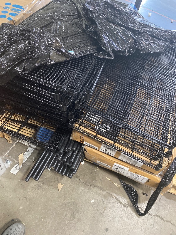 Photo 1 of ***Large bundle of metal shelves on wheels 
