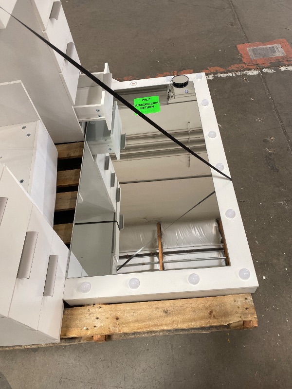 Photo 1 of ***MINOR DAMAGE TO THE WOOD****THE CABLE TO TURN ON THE MIRROR IS MISSING**


DWVO 46'' Glass Top Makeup Vanity with 10 Drawers, Vanity Desk Set with Large LED Mirror, Built-in Charging Station & Cushioned Storage Chair, Dressing Table with 3-Color Light 