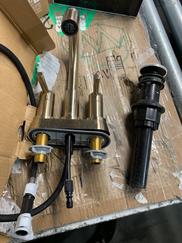 Photo 1 of ***(HEAVILY USED/ MINOR DAMAGE)***Delta Nicoli Centerset Brushed Gold Bathroom Faucet with Sprayer, 4 Inch 3 Hole Bathroom Sink Faucet with Pull Out Sprayer, Push-Pop Drain, Champagne Bronze 25749LF-CZPD