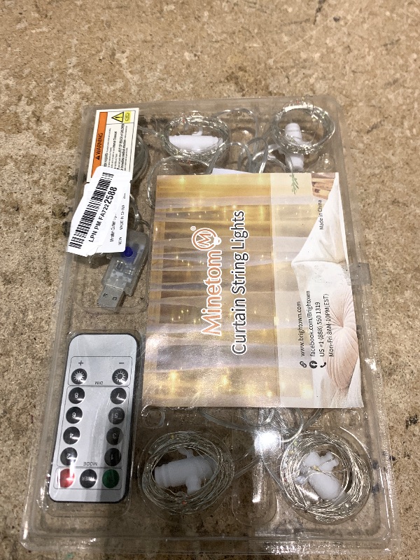 Photo 1 of ***missing power supply*** Minetom Curtain Lights, 300 LED Dimmable Fairy Lights with Remote and Timer, 8 Modes, USB Powered String Lights for Room Wall Party Xmas Indoor Decor, Multicolor