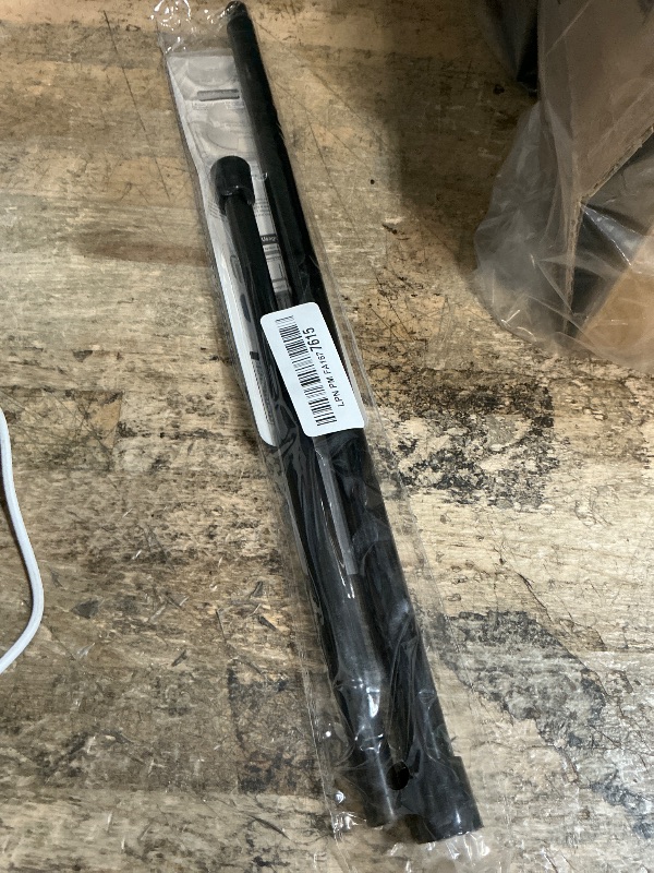 Photo 1 of AIZESI 5/8 Inch Spring Tension Curtain Rods - 1-Pack with 2PCS Curtain Rod Holder, 26 to 39 Inch, Black