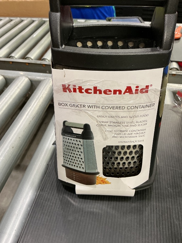 Photo 1 of *Dirty item* KitchenAid Gourmet 4-Sided Stainless Steel Box Grater for Fine, Medium and Coarse Grate, and Slicing, Detachable 3 Cup Storage Container and Measurment Markings, Dishwasher Safe, 10 inches tall, Black