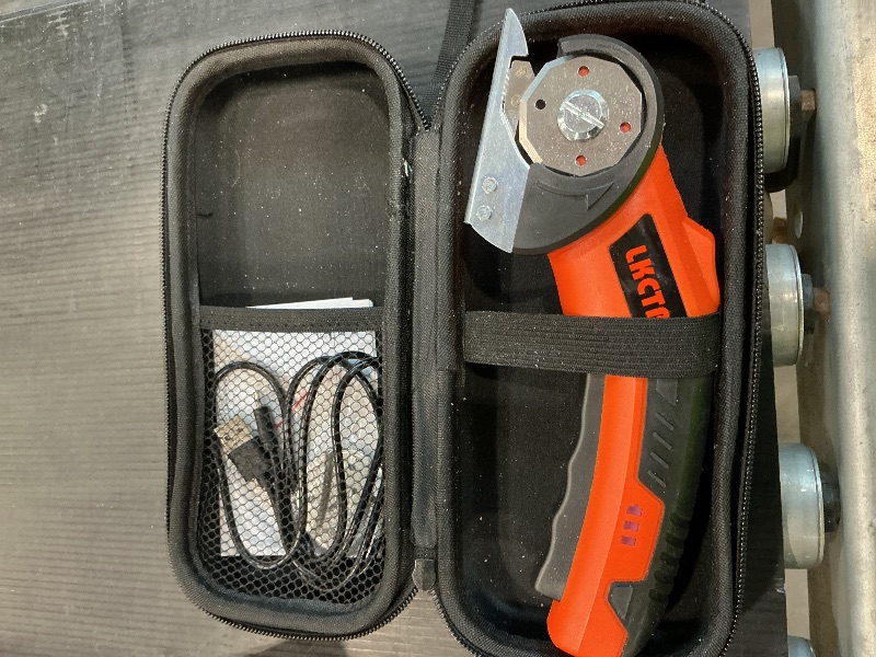 Photo 1 of **UNTESTED**
LKCTB Electric Cardboard Cutter Scissors with LED Light, 2600mAh Rechargeable Battery, Brushless Motor, Tungsten Steel Blade, Cuts Cloth, Leather, Carpet, light orange