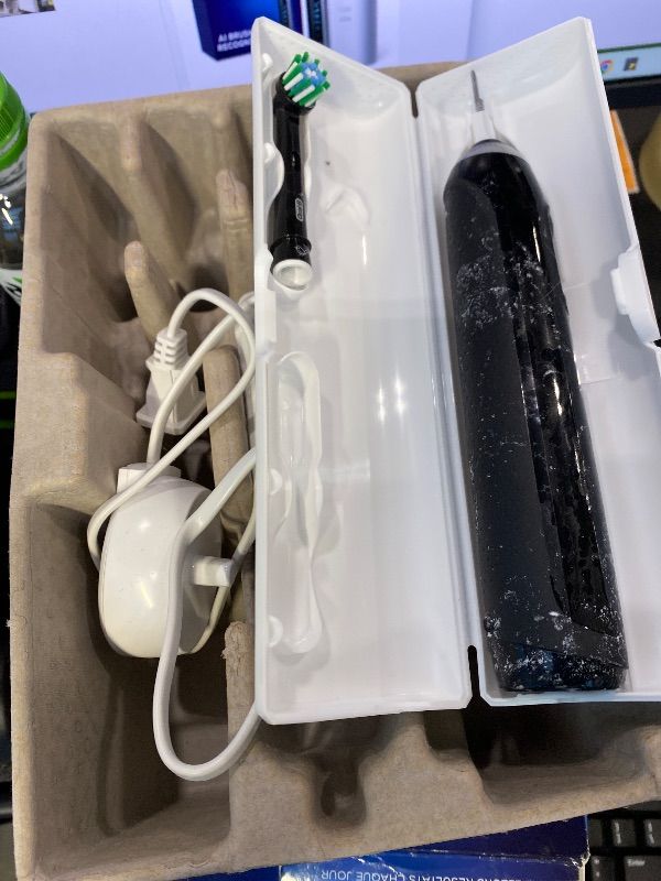 Photo 1 of ***VERY USED*** Oral-B Genius X Limited Rechargeable Electric Toothbrush with 1 Replacement Brush Head, Travel Case, Midnight Black