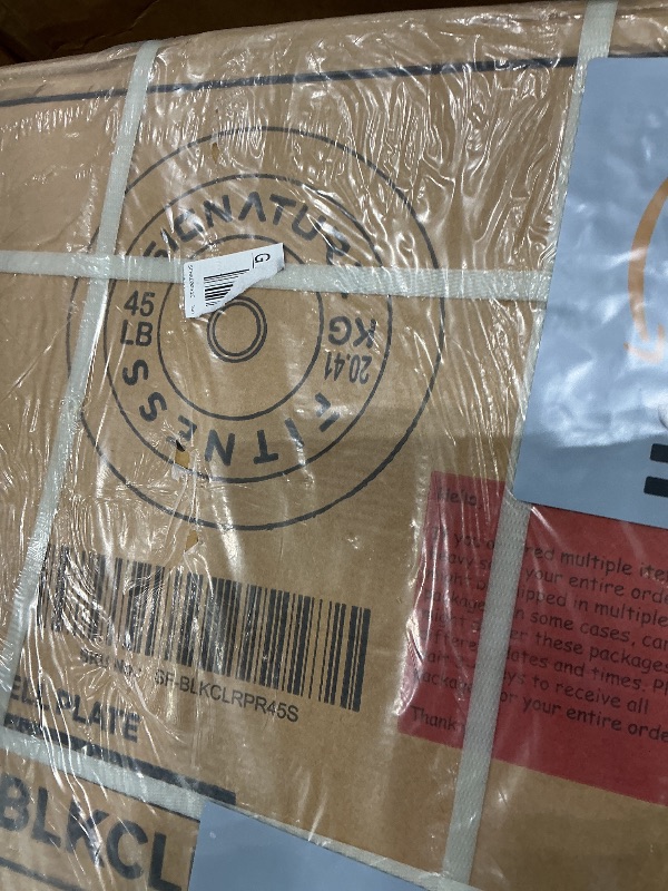 Photo 1 of **MINOR DAMAGE - USED**
1 45lb plate, 2 10lbs plate