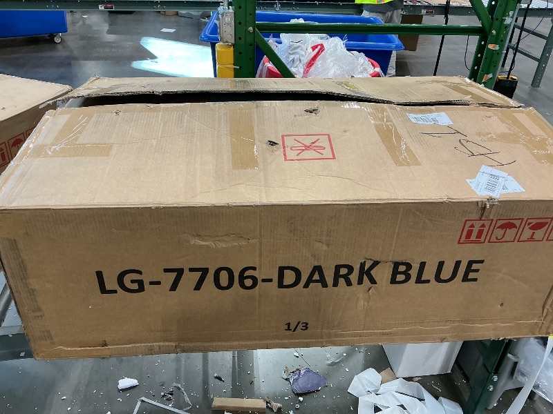 Photo 1 of dark blue loveseat with pullout bed