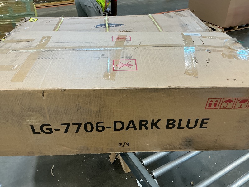 Photo 1 of dark blue loveseat with pullout bed