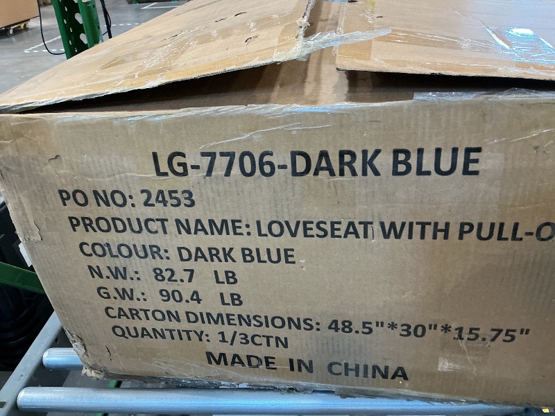 Photo 1 of dark blue loveseat with pullout bed