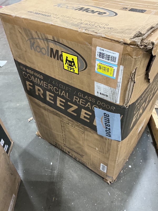 Photo 1 of **MAJOR DAMAGE**
KoolMore 24 in. Commercial Manual Defrost Countertop Display Freezer in White with Stainless Steel and Glass Door, 4.6 Cu. ft. (KM-MDF46GD)
*See Clerk Notes*