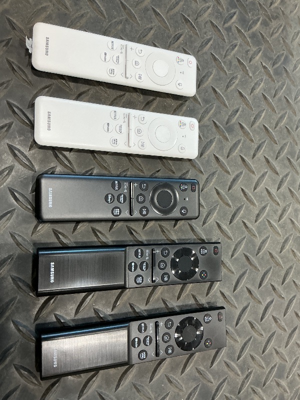 Photo 4 of five TV remotes