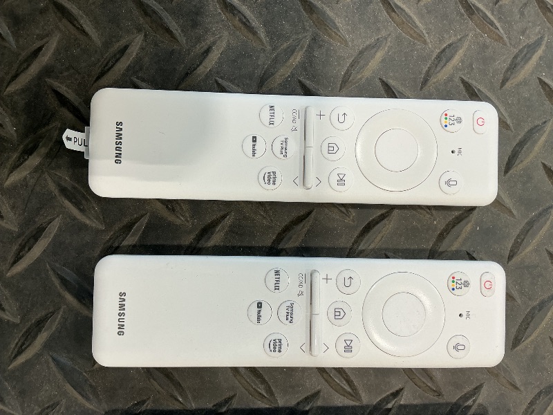 Photo 1 of five TV remotes