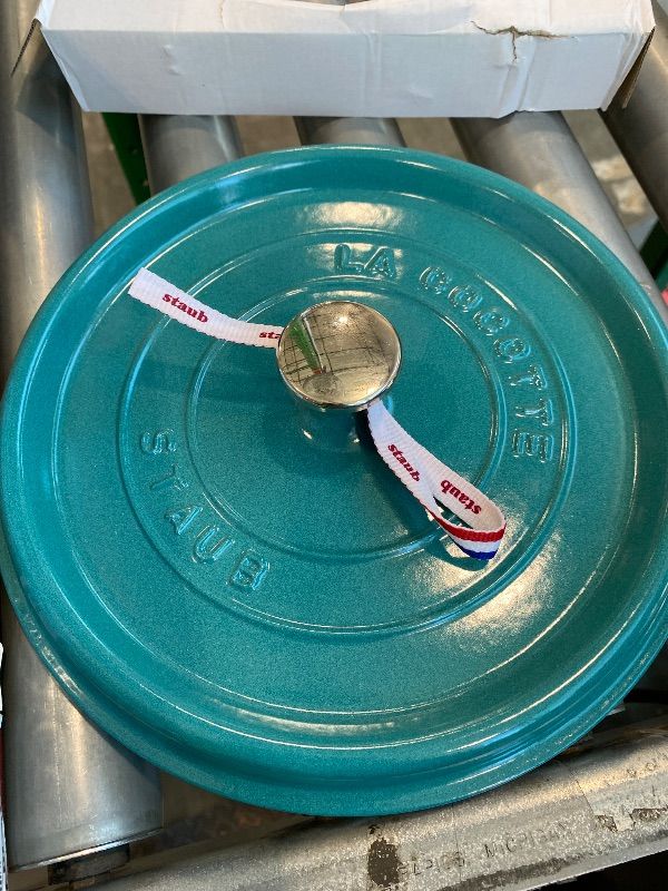 Photo 1 of **MINOR DAMAGE - USED**
STAUB Cast Iron Round Cocotte, Dutch Oven, 4-quart, serves 3-4, Made in France, Turquoise