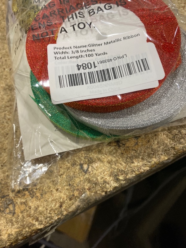 Photo 1 of 100 Yards Metallic Ribbon with Gold & Silver Threads,Glitter Ribbon for Gift Wrapping, Christmas, Valentine’s Day, Bouquet, and DIY Decor (Red,Green,Gold,Silver, 4 Rolls, 3/8 Inch)