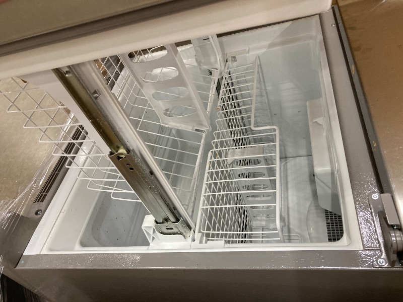 Photo 1 of **the smell is not good, need to clean**Kenmore 33 in. 20.4 cu. ft Capacity Refrigerator/Freezer with Full-Width Adjustable Glass Shelving, Humidity Control Crispers, Ice Maker, ENERGY STAR Certified, Fingerprint Resistant Stainless Steel