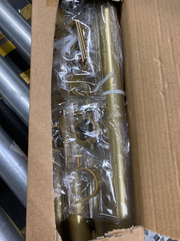Photo 1 of "Gold Wrap Around Industrial Curtain Rod, 66-120 Inches Adjustable, 1-Inch Diameter, Indoor and Outdoor Use"