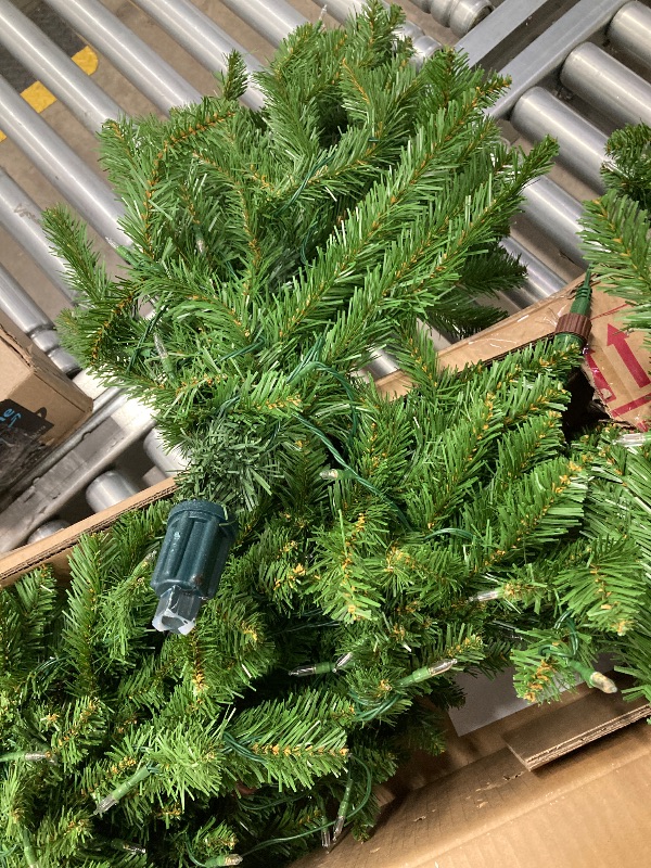 Photo 1 of ***DAMAGED - SELLING AS IS *** 
National Tree Company Artificial Christmas Tree | Includes Pre-strung Multi-Color LED Lights, PowerConnect and Stand | Kingswood Fir Slim - 7 Feet