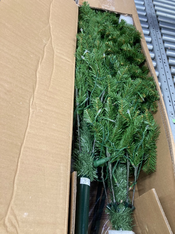 Photo 1 of ***DAMAGED - SELLING AS IS *** 
National Tree Company Artificial Christmas Tree | Includes Pre-strung Multi-Color LED Lights, PowerConnect and Stand | Kingswood Fir Slim - 7 Feet