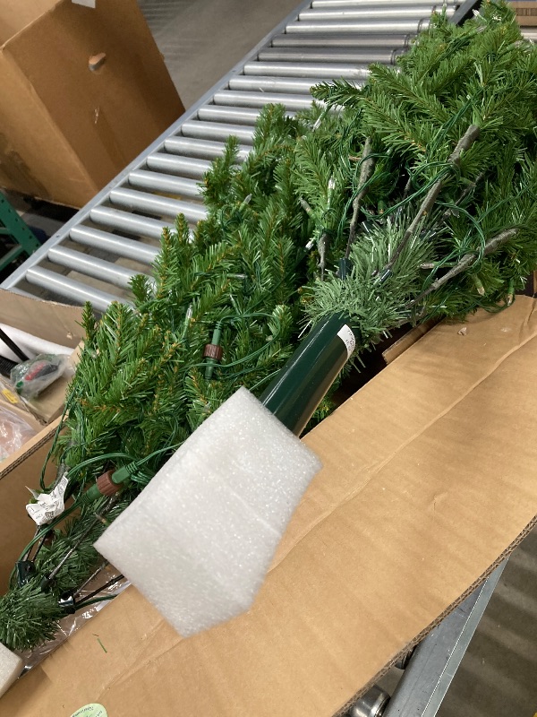 Photo 1 of ***DAMAGED - SELLING AS IS *** 
National Tree Company Artificial Christmas Tree | Includes Pre-strung Multi-Color LED Lights, PowerConnect and Stand | Kingswood Fir Slim - 7 Feet