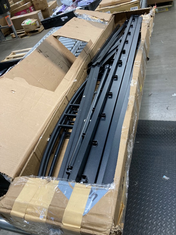 Photo 1 of *Scratched* Metal bed frame with wheels