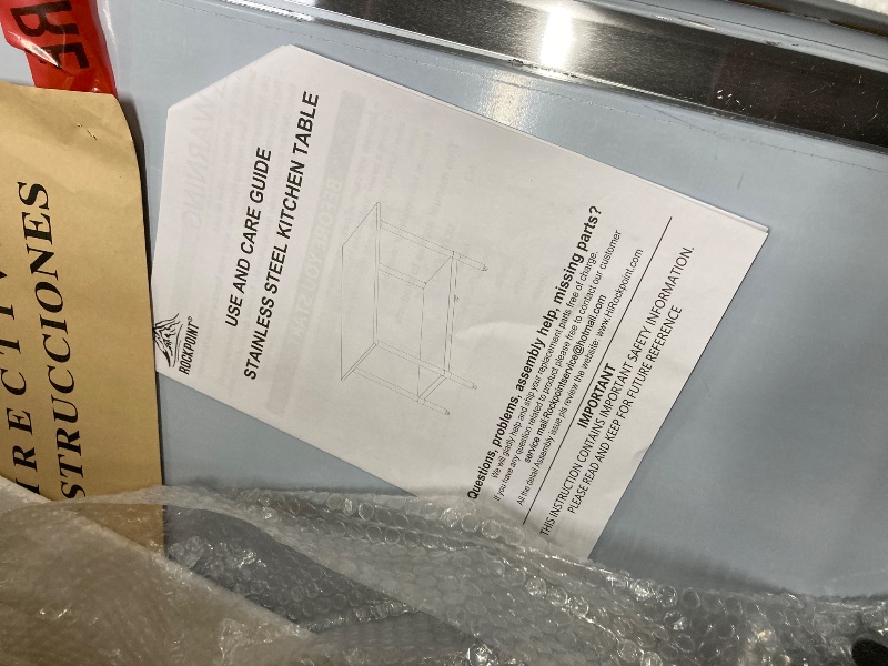 Photo 1 of *Scratched* ROCKPOINT Stainless Steel Table for Prep & Work 24x48 Inches, NSF Metal Commercial Kitchen Heavy Duty Table with Adjustable Under Shelf and Table Foot for Restaurant, Home and Hotel