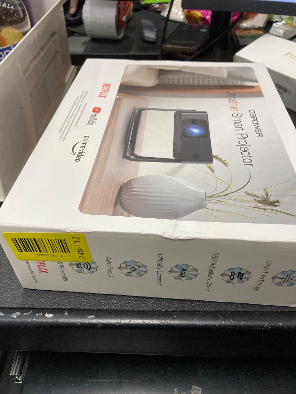Photo 1 of [Ultra-Slim 1.97"| Auto Focus | Built-in Apps | 360° Stand] Smart Mini Projector with WiFi 6 & Bluetooth, Built-in Apps, DBPOWER N5 Movie Projector for Bedroom