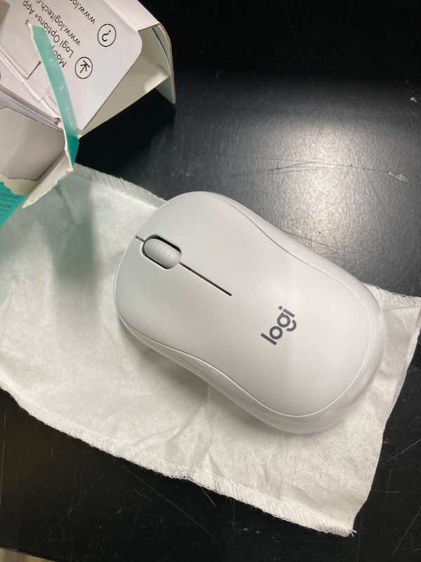 Photo 1 of ***(PART ONLY -SELLING AS IS )*** 
Logitech M240 Silent Bluetooth Mouse, Wireless, Compact, Portable, Smooth Tracking, 18-Month Battery, for Windows, macOS, ChromeOS, Compatible with PC, Mac, Laptop, Tablets - Off White