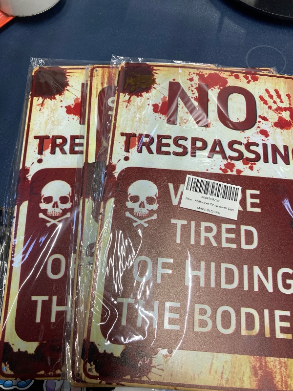 Photo 1 of ***3 PACK***Zapstarz Halloween Decorations Metal Signs, 7.8” x 11.8” Retro Chic Funny Halloween Decor Signs for Outdoor Yard or Indoor, No Trespassing We're Tired of Hiding The Bodies