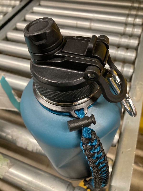 Photo 1 of ***DAMAGED DENTED-SELLING AS IS***

Swigina [2-IN-1 LID] 64 oz Insulated Water Bottle with Silicone Boot (48hrs Cold/24hrs Hot) - DIY Stickers, Leakproof, BPA Free, Half Gallon