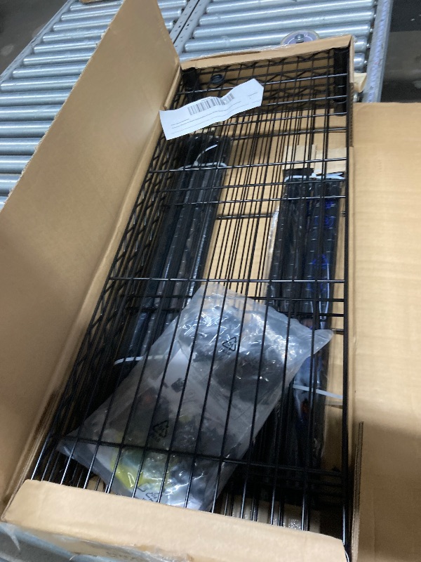 Photo 1 of **It's used, it's missing a part and it's not known if it works 100%.****Amazon Basics 4-Shelf Adjustable Heavy Duty Steel Wire Rack Storage Shelving Organizer for Kitchen, Garage, 36" L x 14" W x 54" H, Black