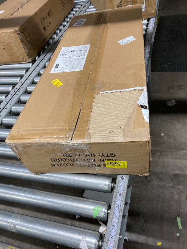 Photo 1 of **It's used, it's missing a part and it's not known if it works 100%.****Amazon Basics 4-Shelf Adjustable Heavy Duty Steel Wire Rack Storage Shelving Organizer for Kitchen, Garage, 36" L x 14" W x 54" H, Black