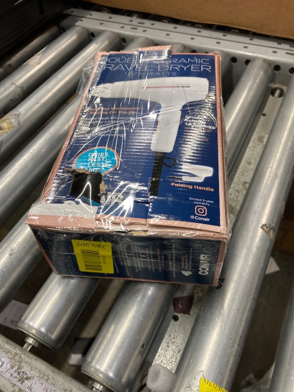 Photo 1 of **It's used, it's missing a part, and it's not known if it works 100%.****Conair Hair Dryer, Worldwide Travel Hair Dryer with Smart Voltage Technology and Folding Handle, Includes Concentrator