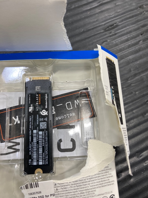 Photo 1 of **It's used, it's missing a part, and it's not known if it works 100%.***Western Digital 1TB SN850 NVMe SSD for PS5 Consoles Solid State Drive with Heatsink - Gen4 PCIe, M.2 2280, Up to 7,000 MB/s - WDBBKW0010BBK-WRSN