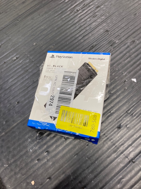 Photo 1 of **It's used, it's missing a part, and it's not known if it works 100%.***Western Digital 1TB SN850 NVMe SSD for PS5 Consoles Solid State Drive with Heatsink - Gen4 PCIe, M.2 2280, Up to 7,000 MB/s - WDBBKW0010BBK-WRSN