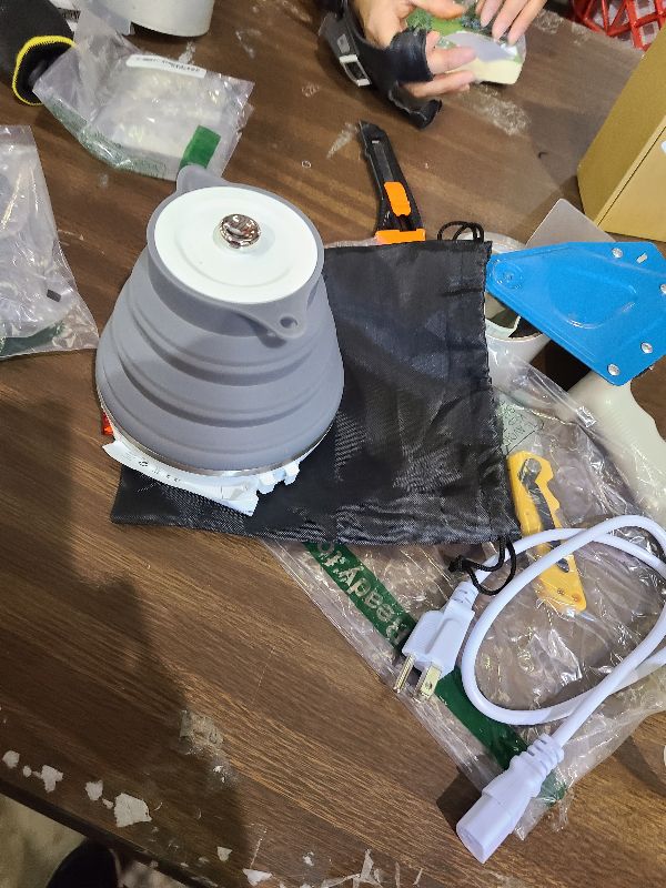 Photo 1 of 110V 555ML Ultrathin Travel Foldable Electric Kettle with Separable Power Cord and Handle, Boil Dry Protection, Food Grade Silicone