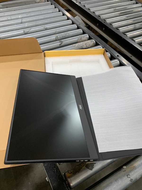 Photo 1 of **SELLING FOR PARTS**AOC 16T20 Portable Monitor 15.6" FHD 1080p IPS Display, USB-C, Mini HDMI, Built-in Speakers, Travel Monitor with Smart Cover, Compatible with Laptops, MacBook, Gaming Console Ready